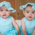 Twin girls in matching outfits photo