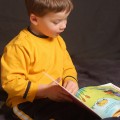 Child Reading Book