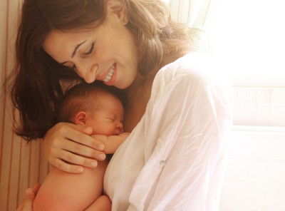 Mother with her baby - Shutterstock