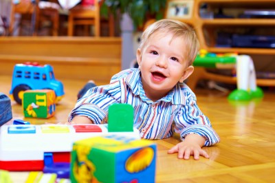 Toddler playing on the floor