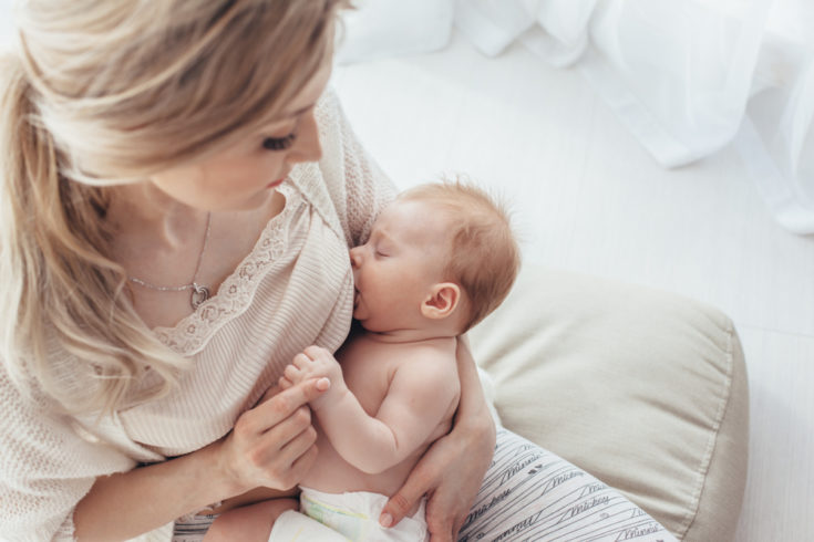 Breast feeding cute baby