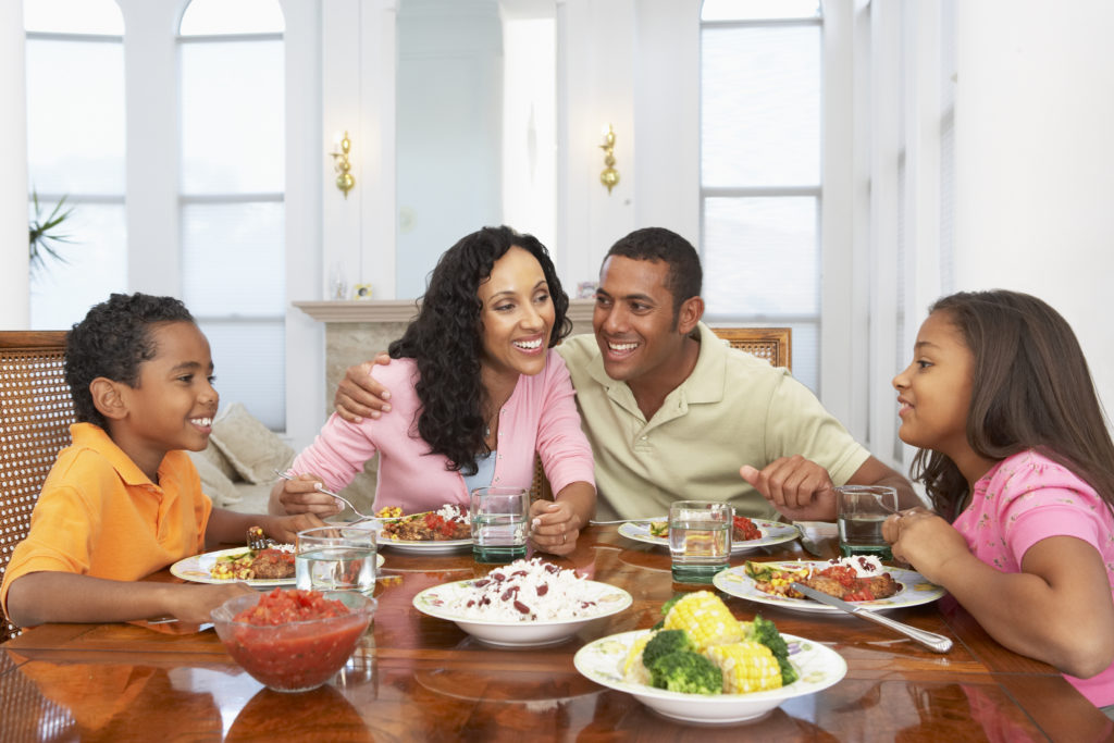 Family Having A Meal Together At Home