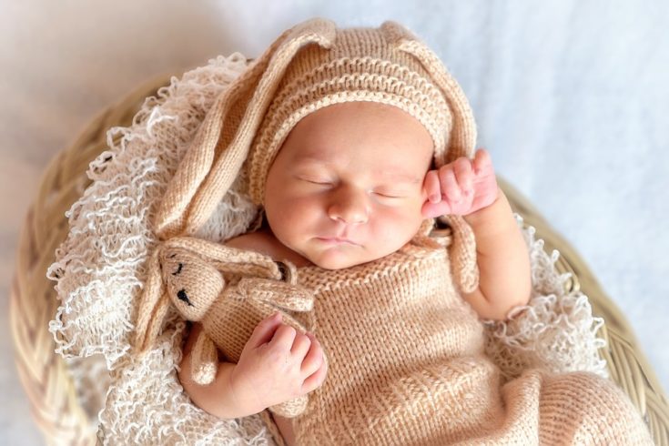 Cute Newborn in crocheted bunny outfit