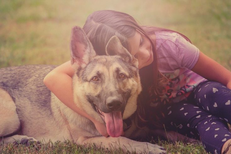 girl with family dog