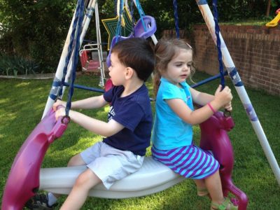 kids on swing at daycare